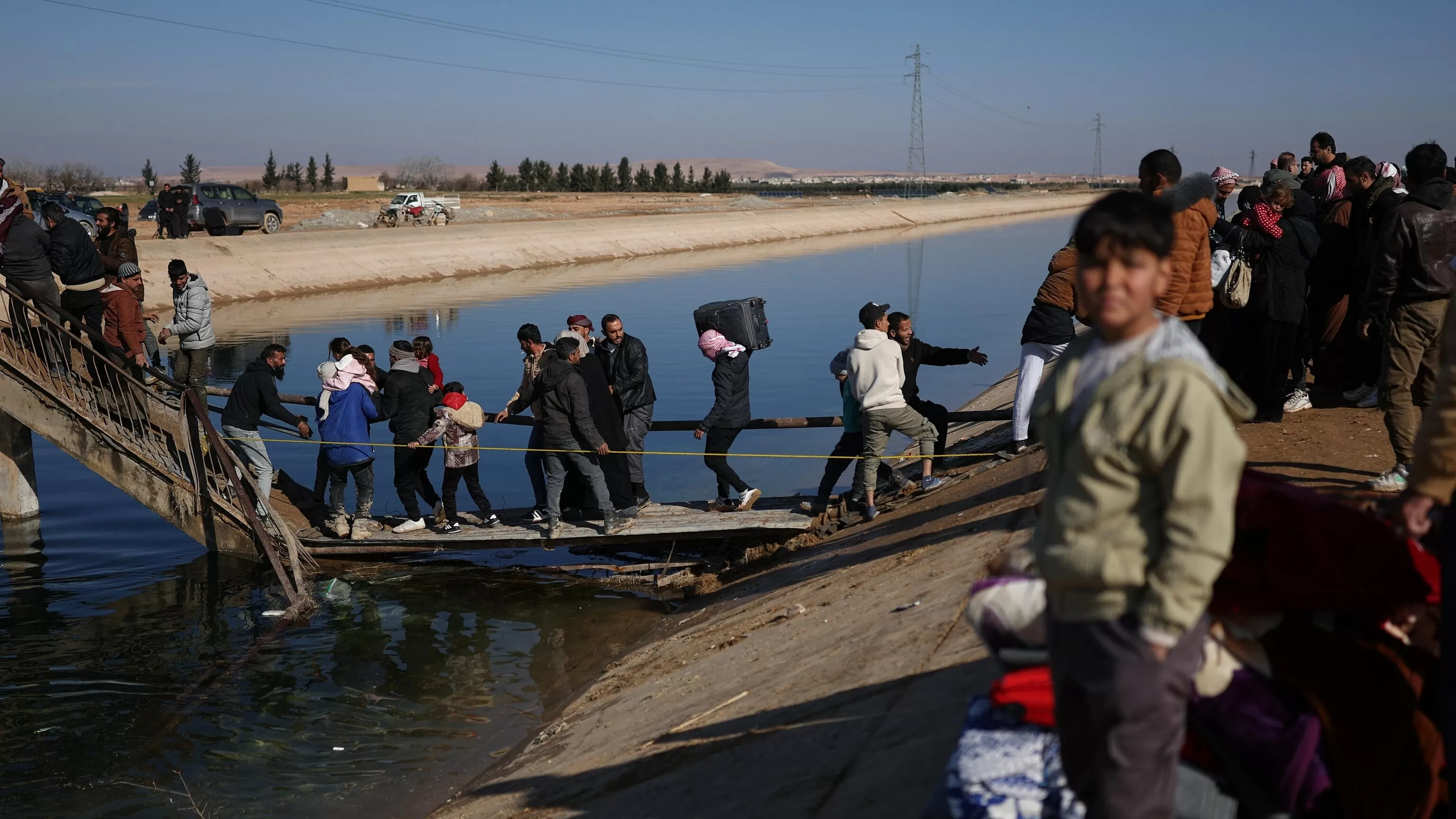 Hundreds flee to government-held areas in north Syria ahead of possible offensive
