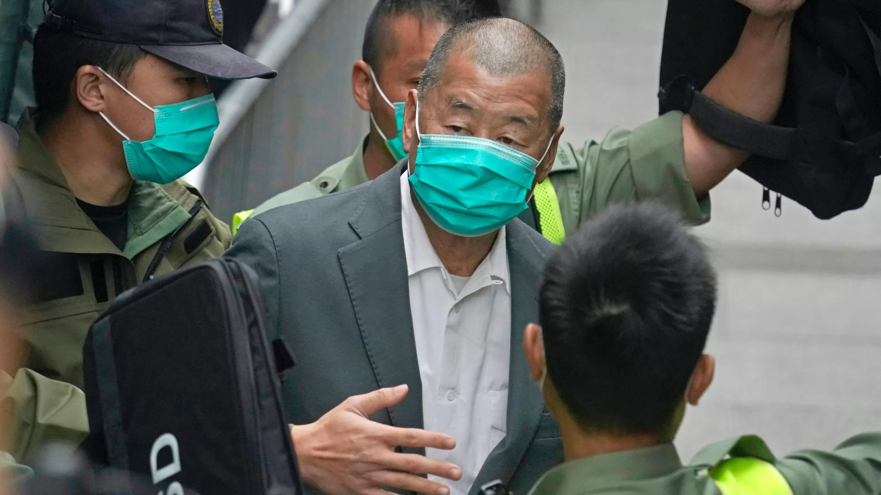 Hong Kong ex-media tycoon Jimmy Lai sentenced to 20 years in prison in national security case