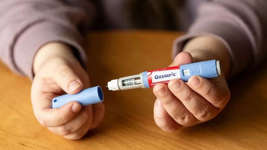 Children ‘bombarded’ with weight-loss drug ads online, commissioner warns