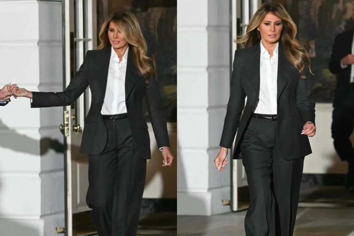 Melania Trump Brings Back Political Power Dressing In Dark Grey Pantsuit