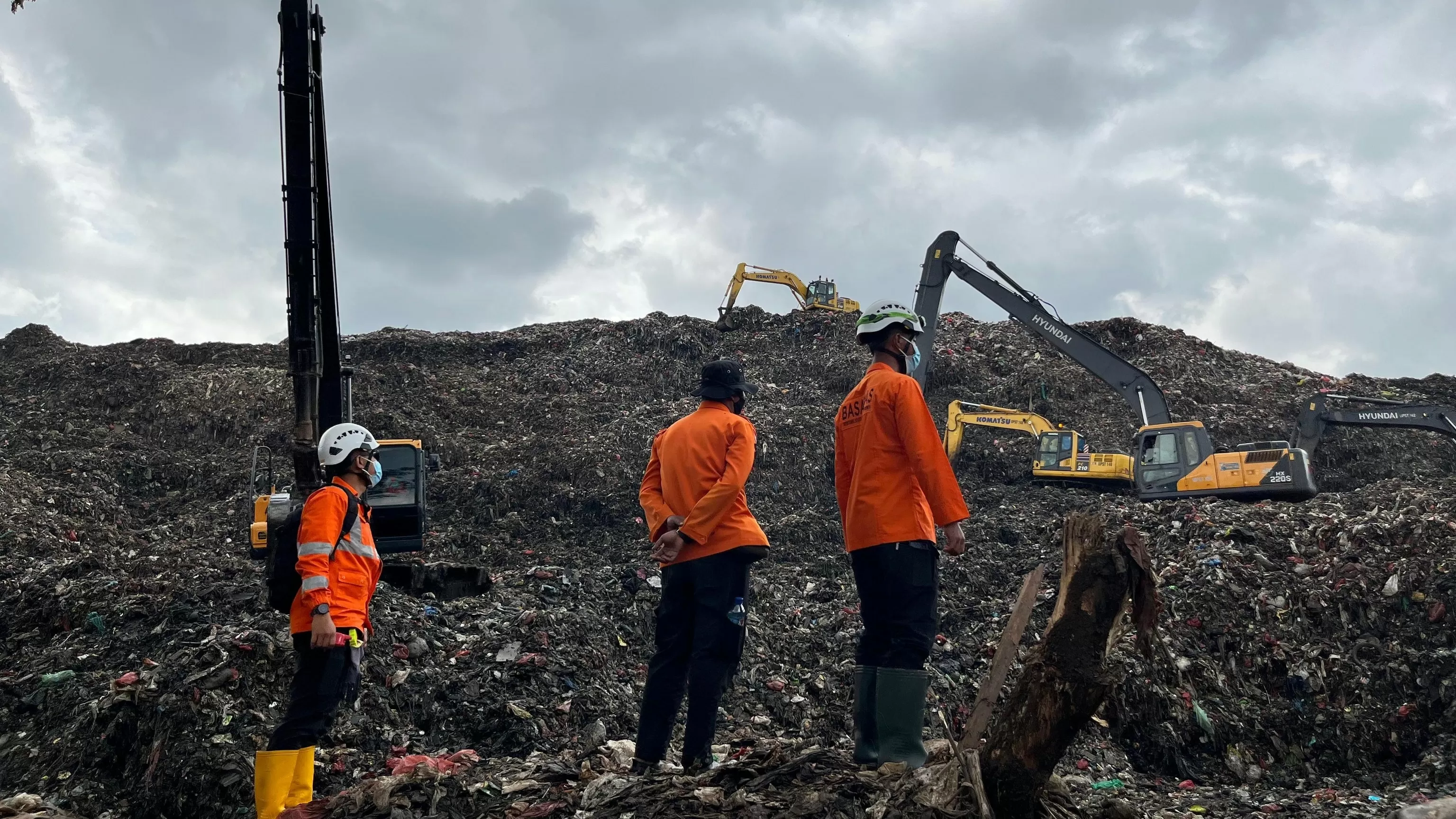 Waste mound collapse at Indonesia's largest landfill kills at least 5 and leaves several missing