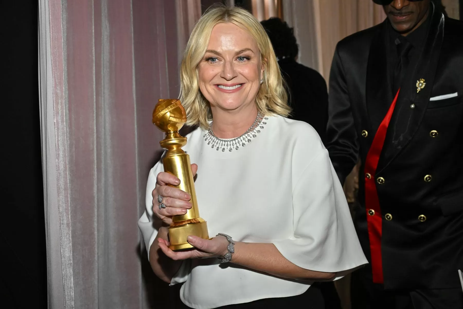 Amy Poehler, Alex Cooper, Mel Robbins & More Nominated for 2026 iHeartPodcast Awards: Full List