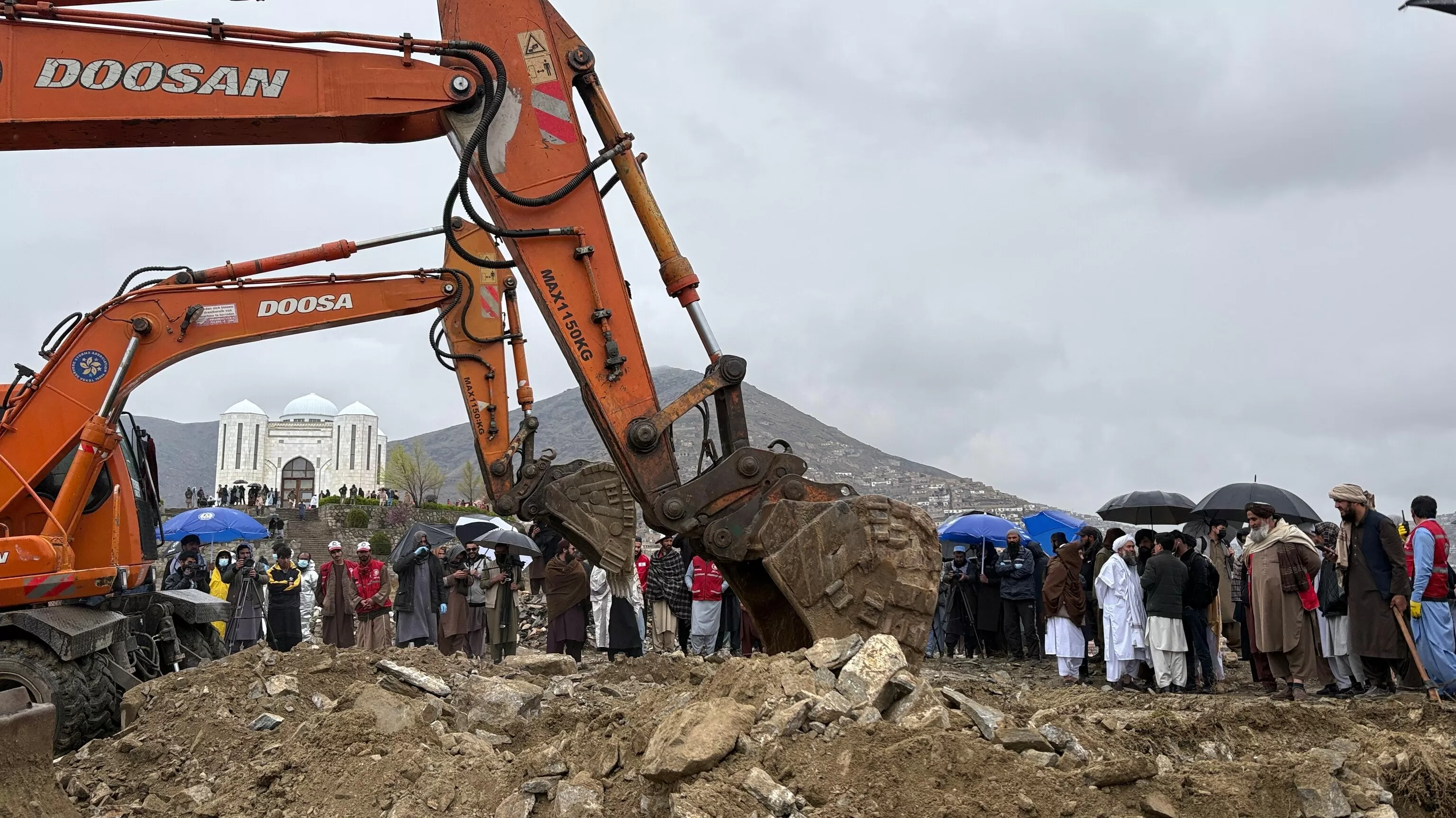 Mass funeral held in Kabul for victims of strike on hospital that Afghanistan blames on Pakistan