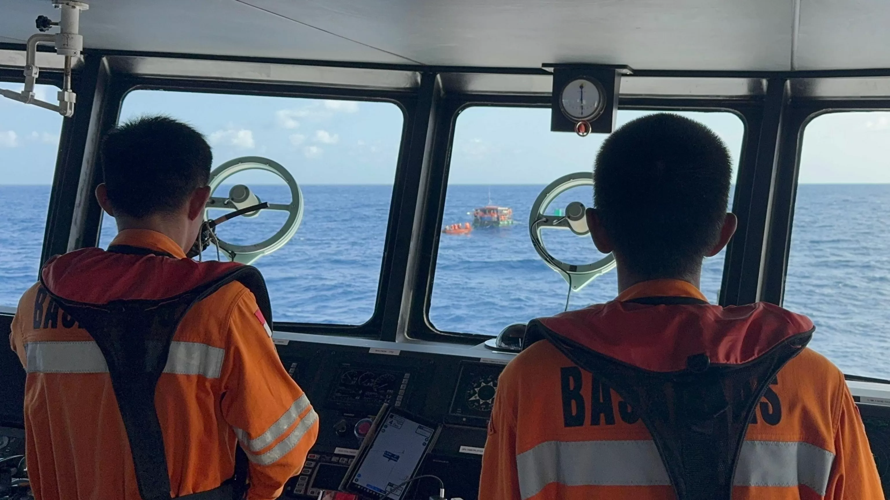 Rescuers find 21 people on raft drifting in Indonesian waters after their boat sinks
